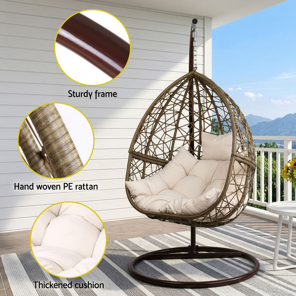 Sillón columpio para exteriores Gardeon con forma de huevo, mueble de mimbre y ratán, soporte tipo cápsula, cojín, café con leche