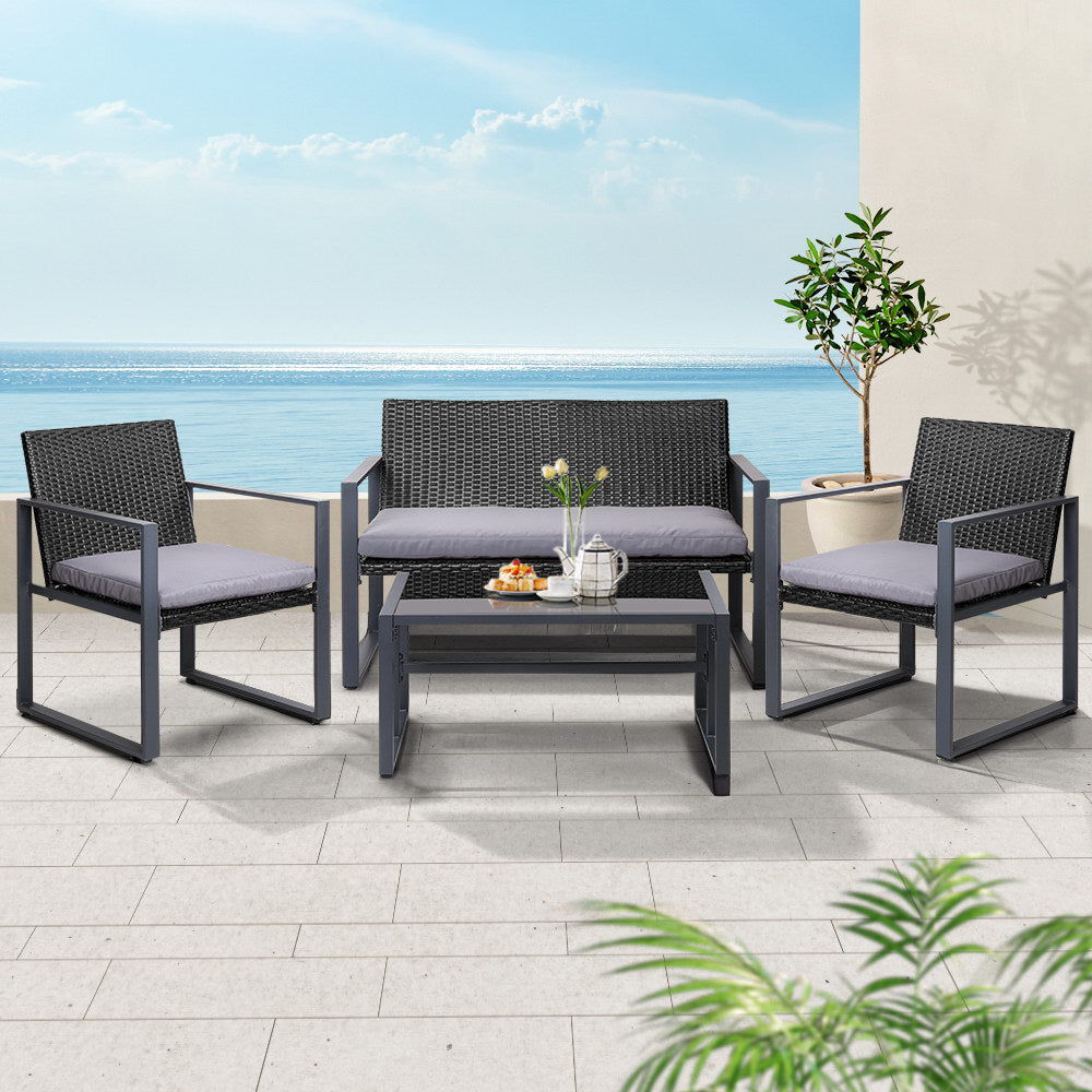 Conjunto de 4 sofás para exterior Gardeon, muebles de ratán, mesa con tablero de vidrio y sillas, color negro