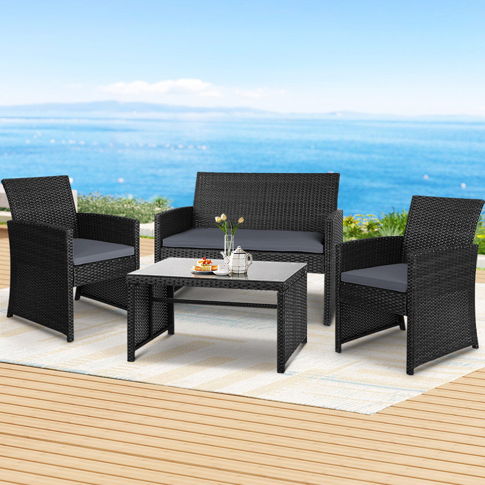 Conjunto de 4 sofás de exterior Gardeon con mesa y sillas de ratán, muebles de jardín en color negro